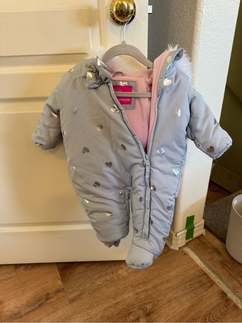 Weatherproof Gray One-Piece Footed Snowsuit with Pink Lining and Metallic Hearts